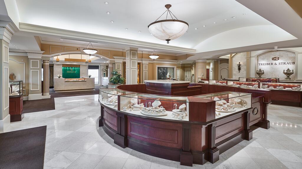 Treiber & Straub opened at the Mayfair Mall in 1980 and moved to its current location in Brookfield, Wisconsin, in 2000. Mike Straub owns and operates the business with his daughters, Kimberly and Tracy Straub. Interior of Treiber & Straub jewelry store Brookfield, Wisconsin